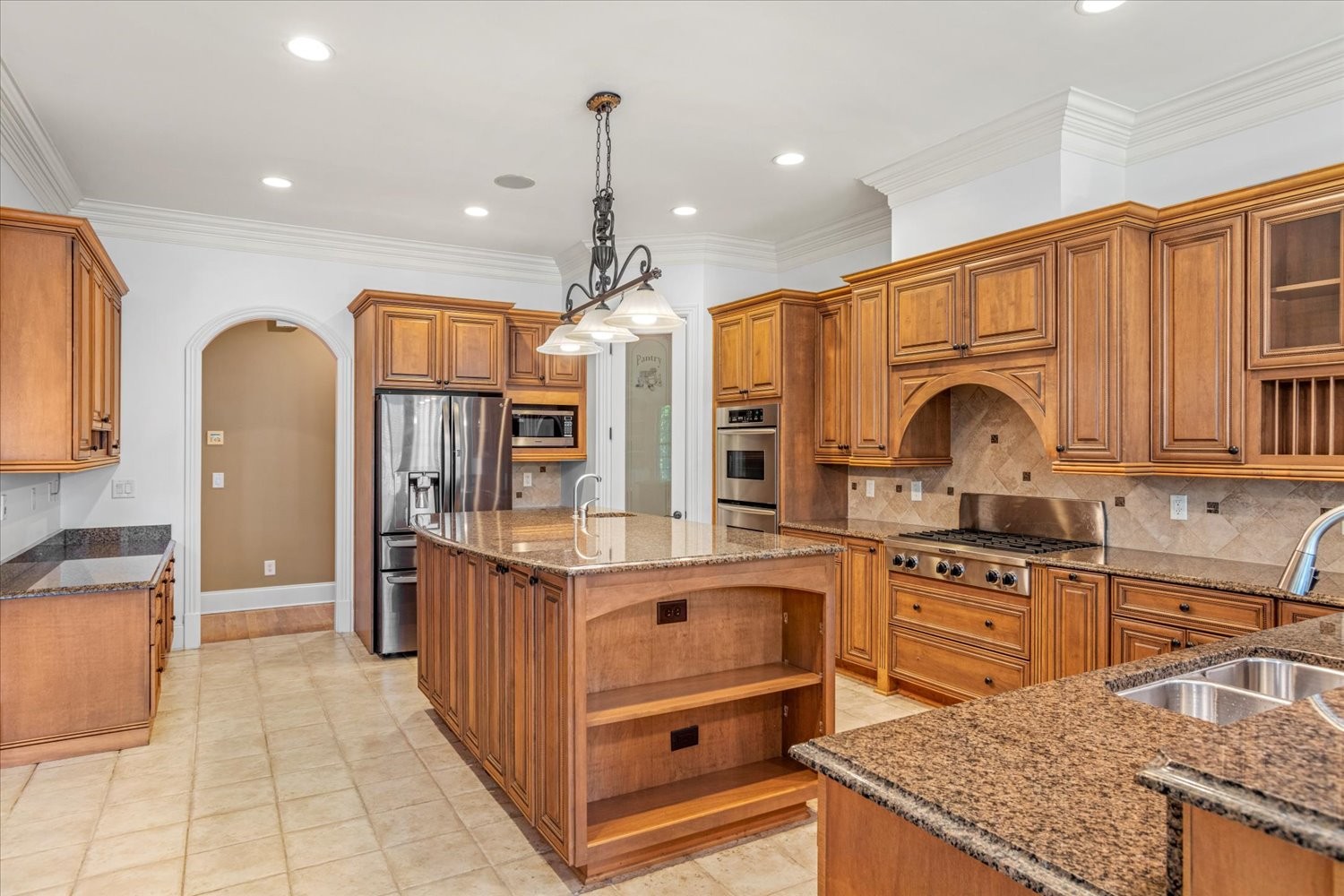 1400 Franklin Road Brentwood, TN 37027 - Photo 22 of 67 a kitchen with stainless steel appliances granite countertop a sink and cabinets