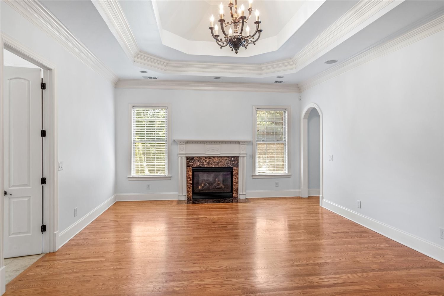 1400 Franklin Road Brentwood, TN 37027 - Photo 28 of 67 a view of a livingroom with a fireplace window and wooden floor