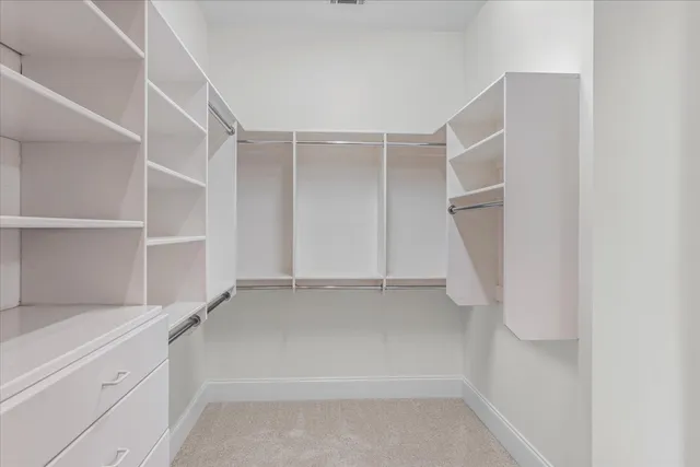 a bathroom with a sink vanity and a mirror