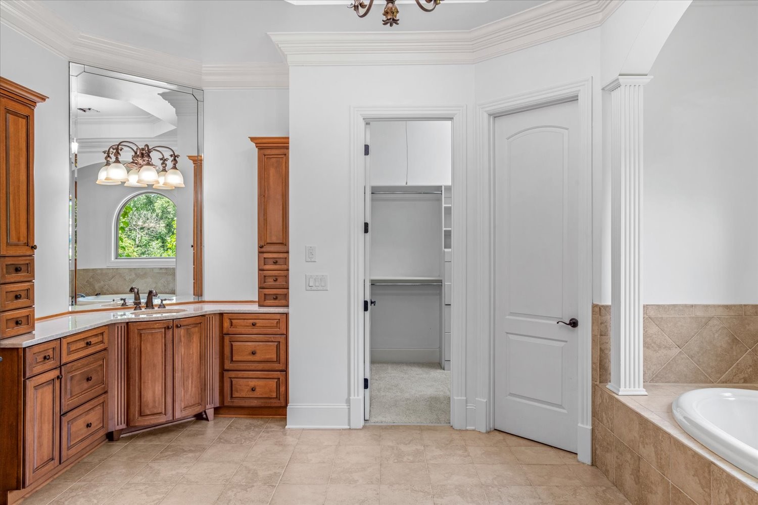 1400 Franklin Road Brentwood, TN 37027 - Photo 36 of 67 a bathroom with a tub sink and mirror