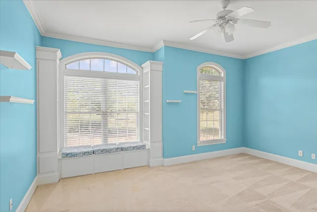 a view of a room with windows