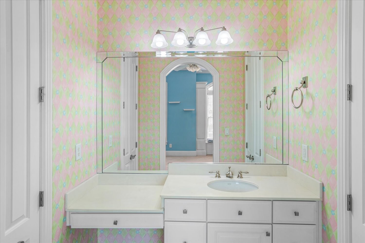 1400 Franklin Road Brentwood, TN 37027 - Photo 40 of 67 a bathroom with a sink vanity and a mirror