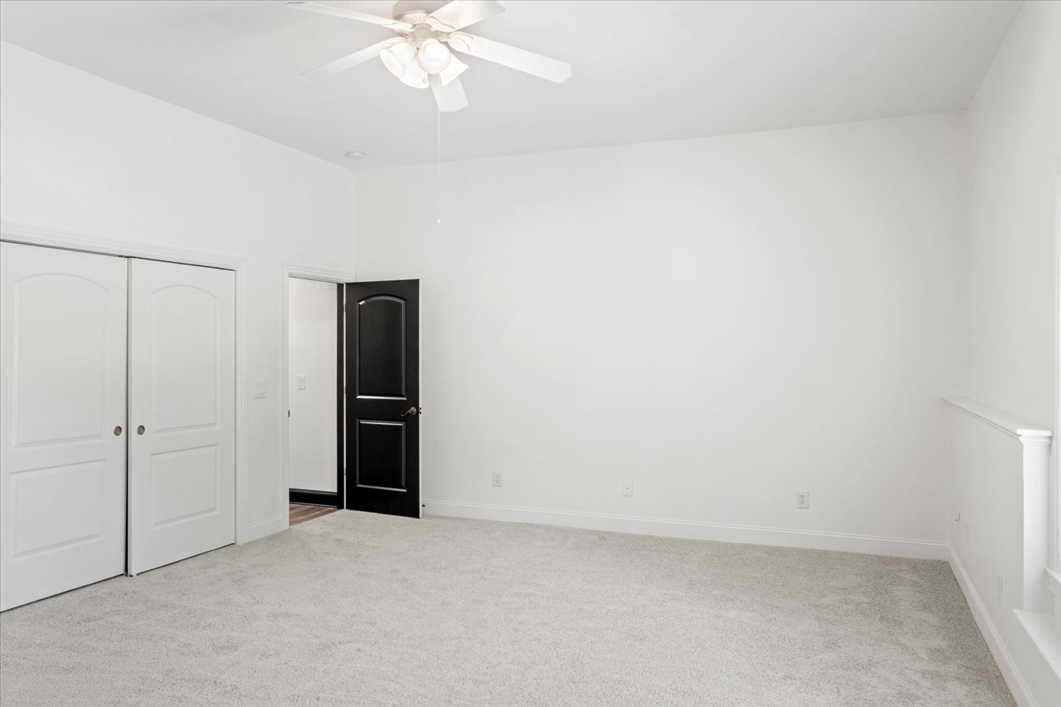 1400 Franklin Road Brentwood, TN 37027 - Photo 58 of 67 an empty room with closet and a chandelier fan
