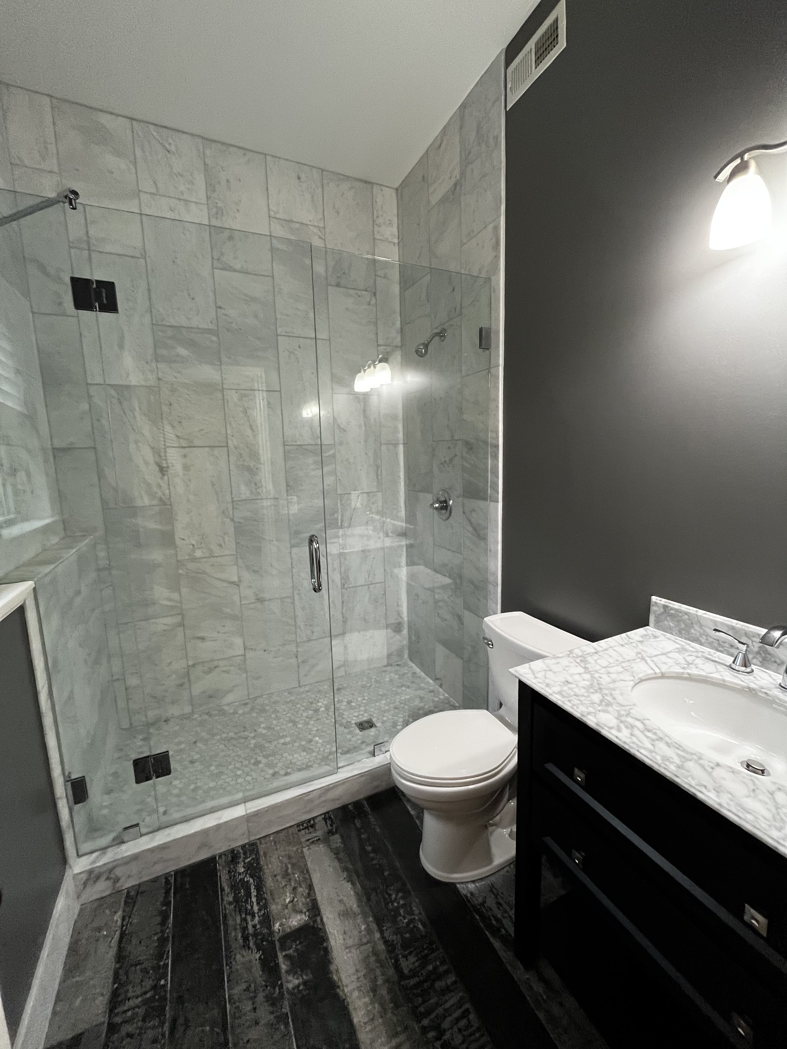 1400 Franklin Road Brentwood, TN 37027 - Photo 59 of 67 a bathroom with a granite countertop sink toilet and shower