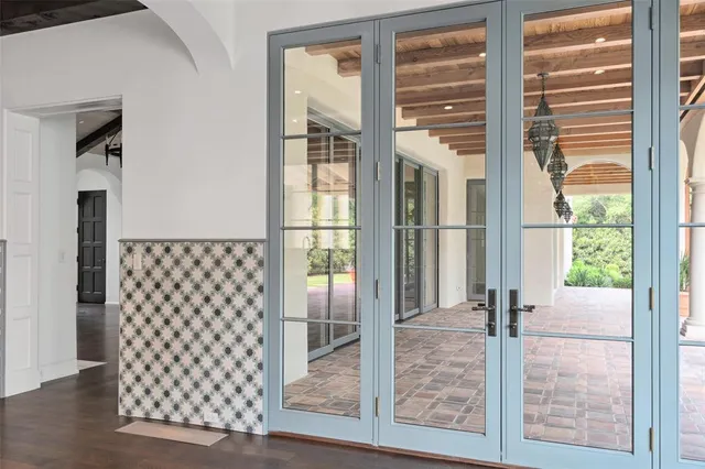 a view of a bathroom from the door
