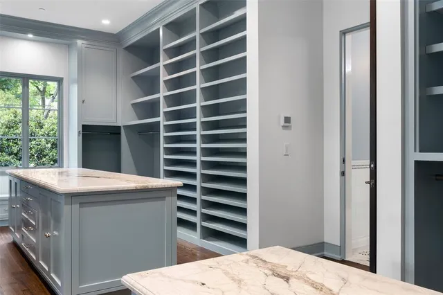 a room with a furniture and a window