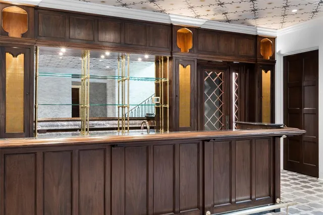 a view of a living room with a large window