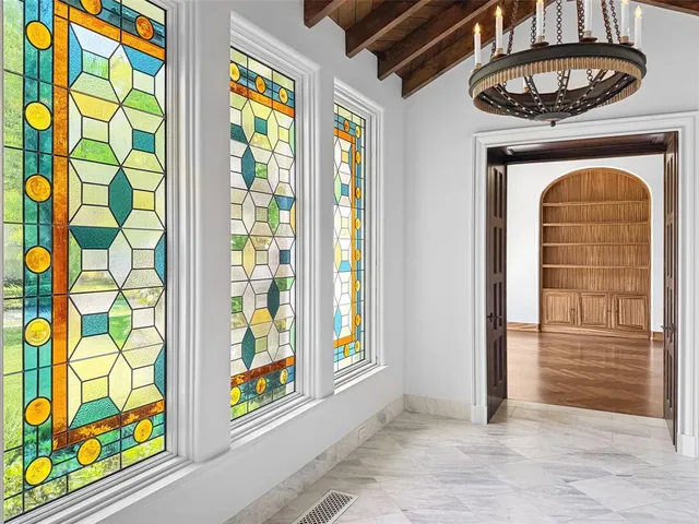 a view of an entryway with a fireplace