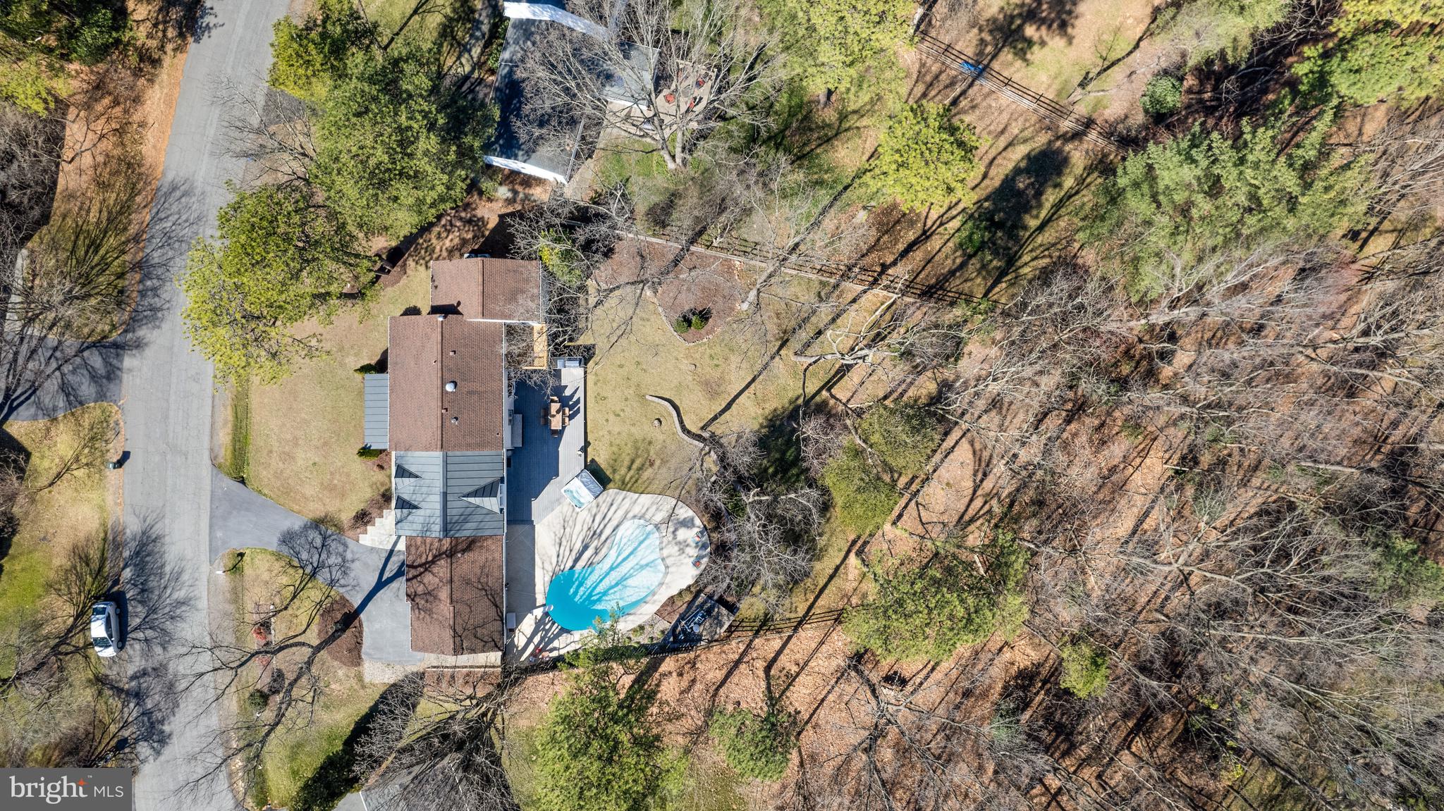 1807 Post Oak Trail Reston, VA 20191 - Photo 72 of 79 an aerial view of a house with a yard