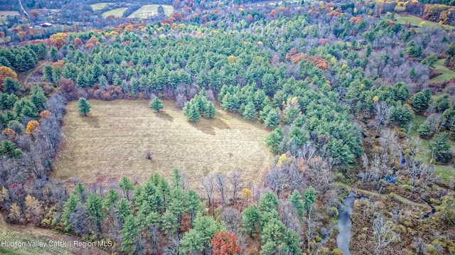 a picture of a building with a tree in the background