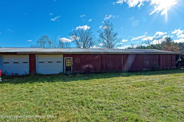 a view of a yard with a tree