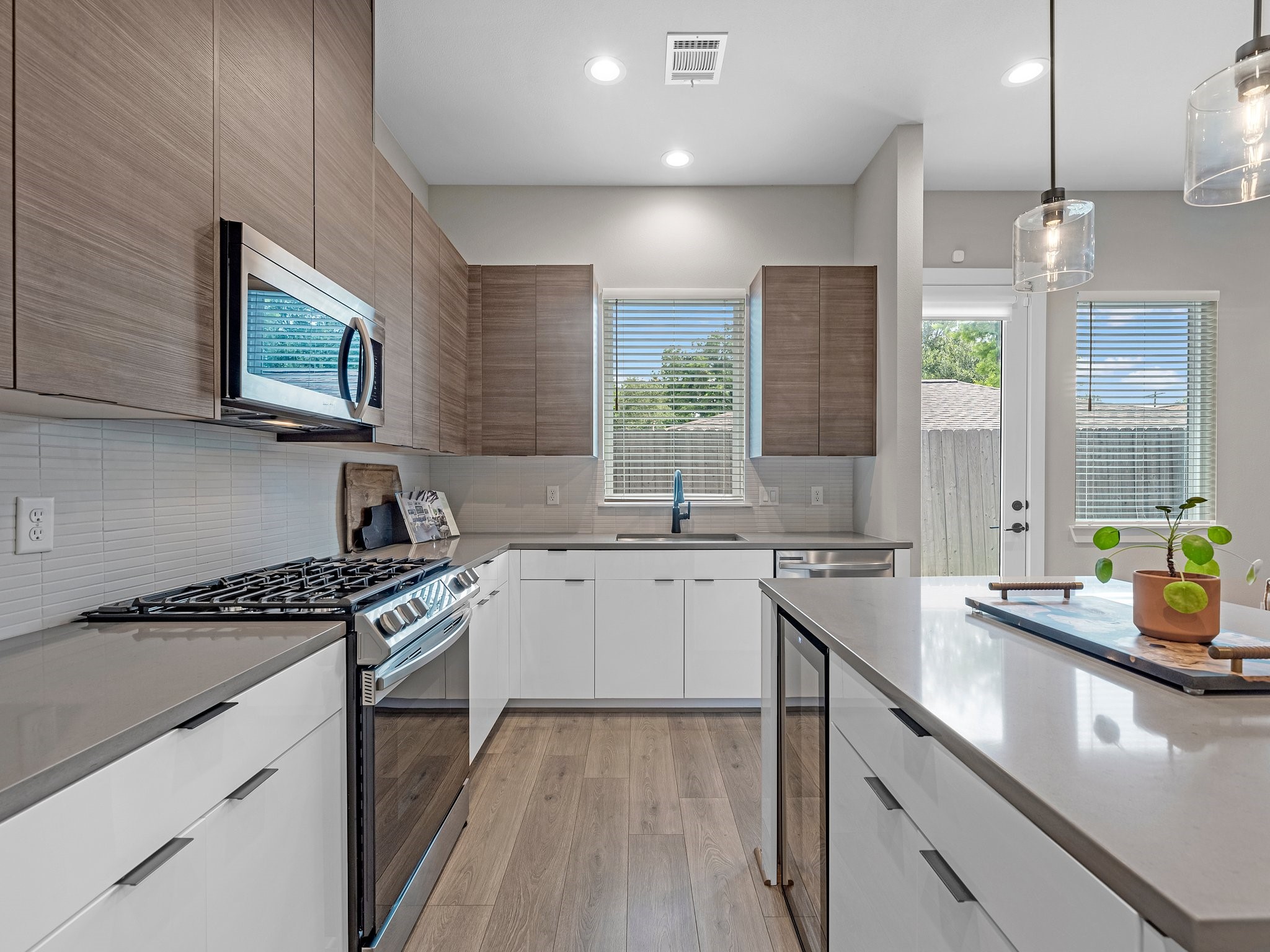 307 Charlock Street Houston, TX 77022 - Photo 1 of 18 a kitchen with stainless steel appliances granite countertop a sink stove and cabinets