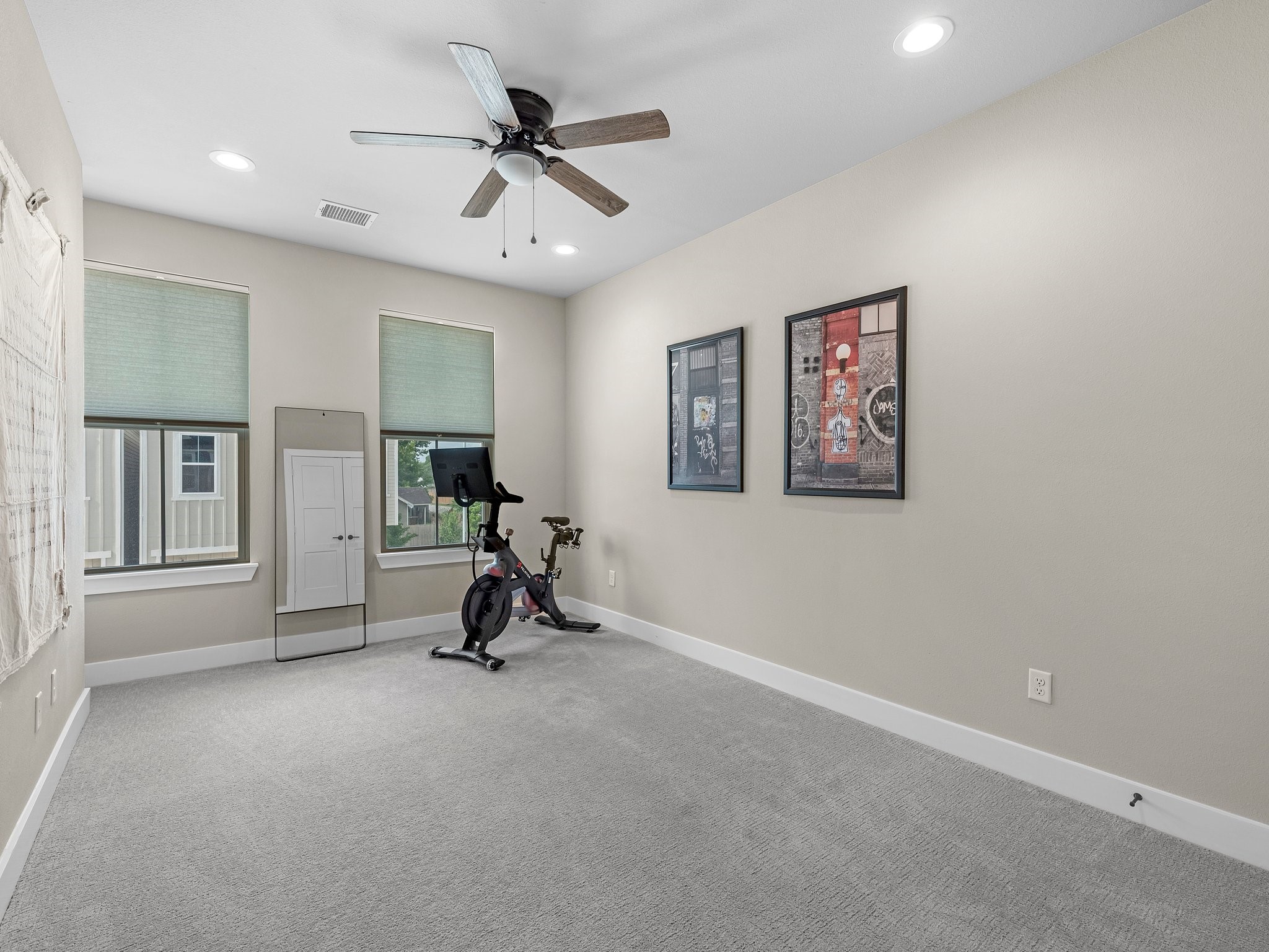 307 Charlock Street Houston, TX 77022 - Photo 9 of 18 a view of a room with gym equipment