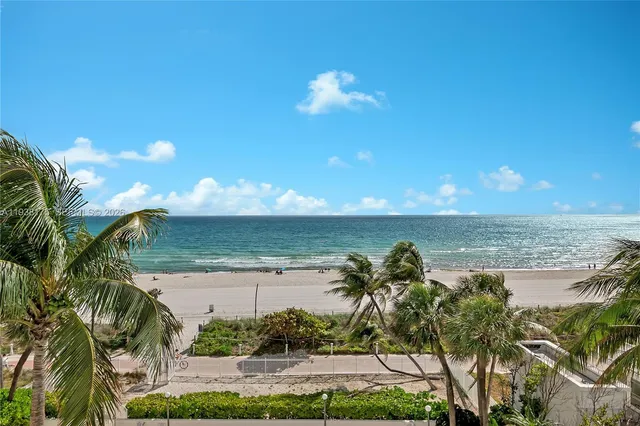a view of a lake with a beach