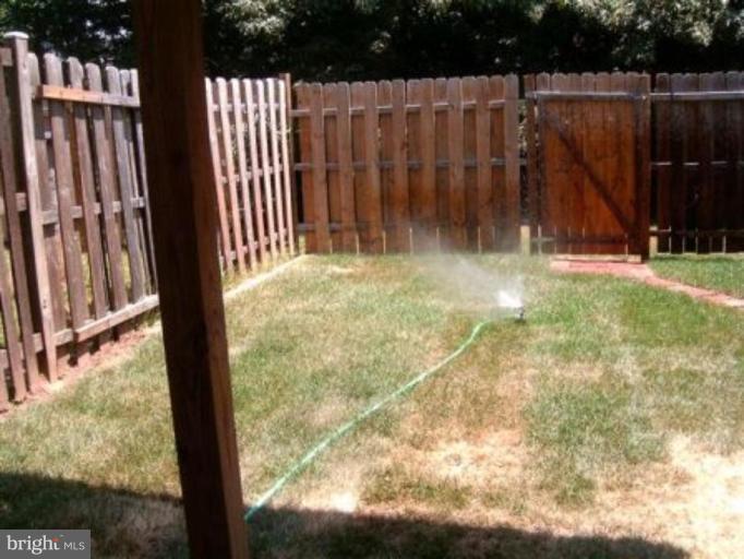 7483 Wounded Knee Road Lorton, VA 22079 - Photo 2 of 4 Back yard
