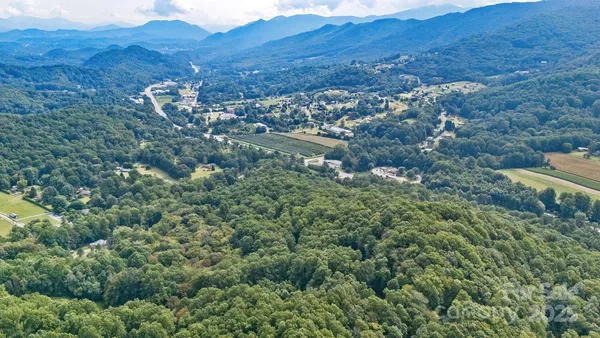 an aerial view of residential house and outdoor space
