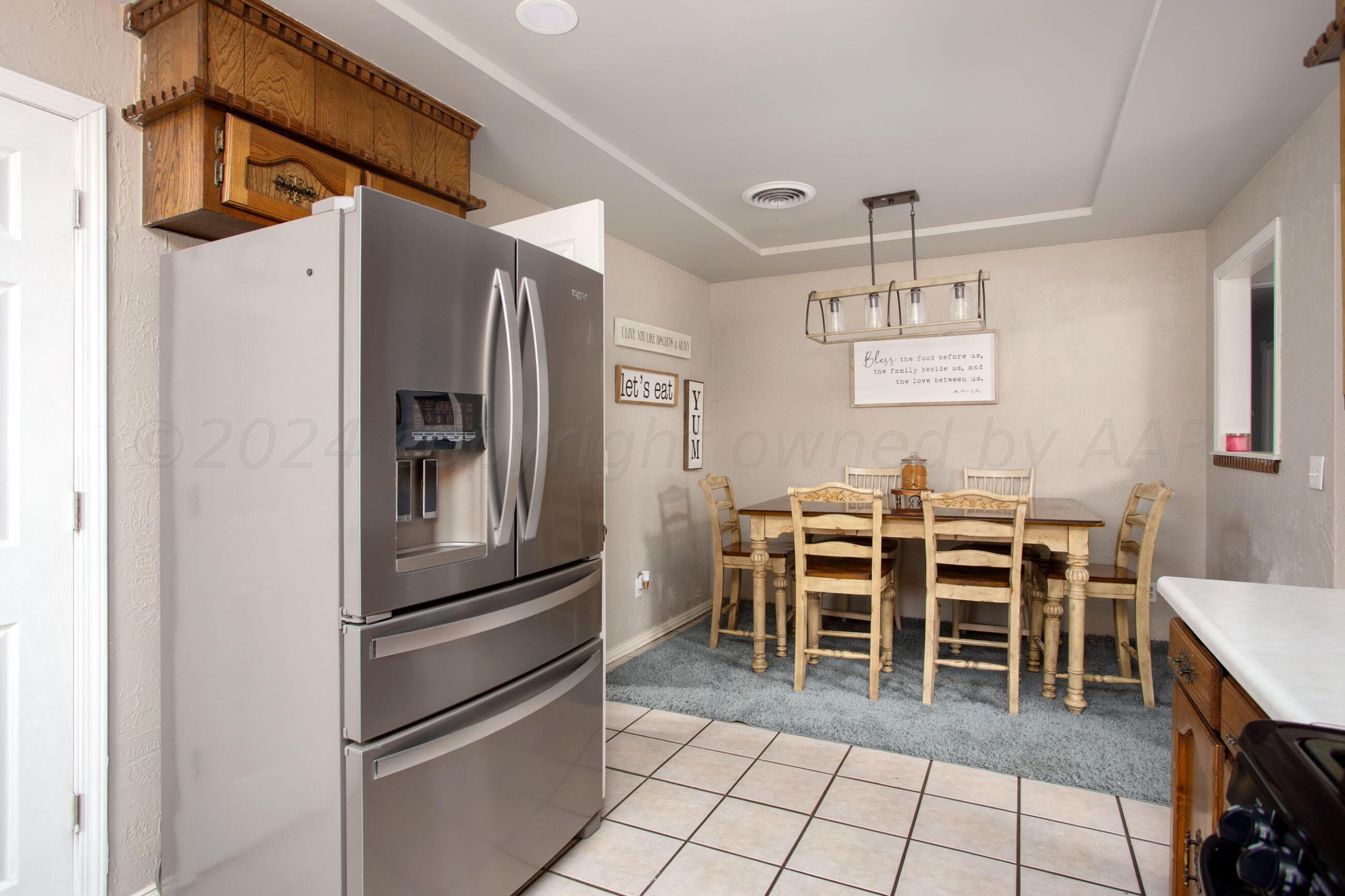 8122 Santa Fe Trail Amarillo, TX 79110 - Photo 7 of 23 a view of a kitchen area