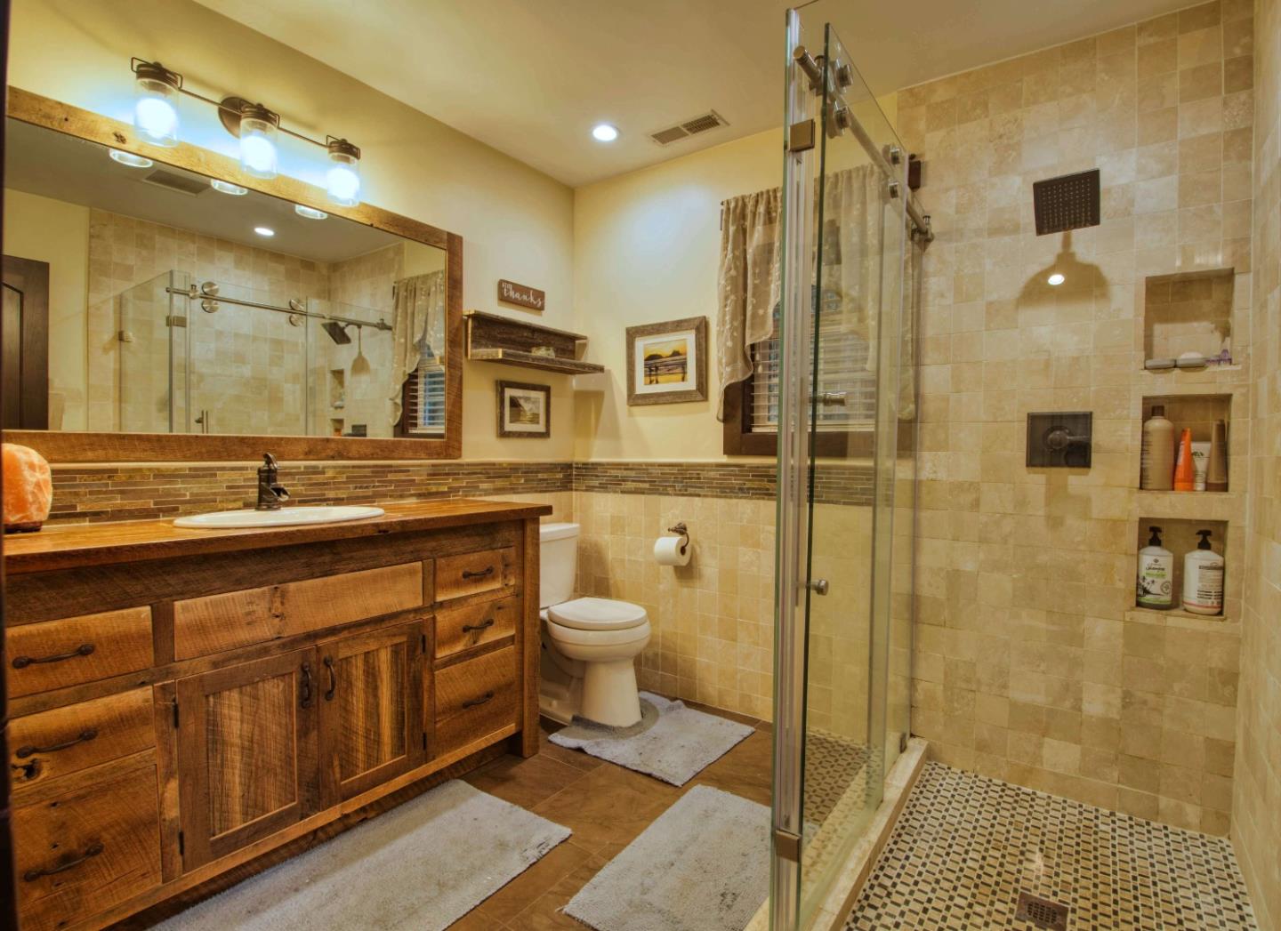 Long Ridge Road Los Gatos, CA 95033 - Photo 12 of 30 a spacious bathroom with a shower sink and mirror