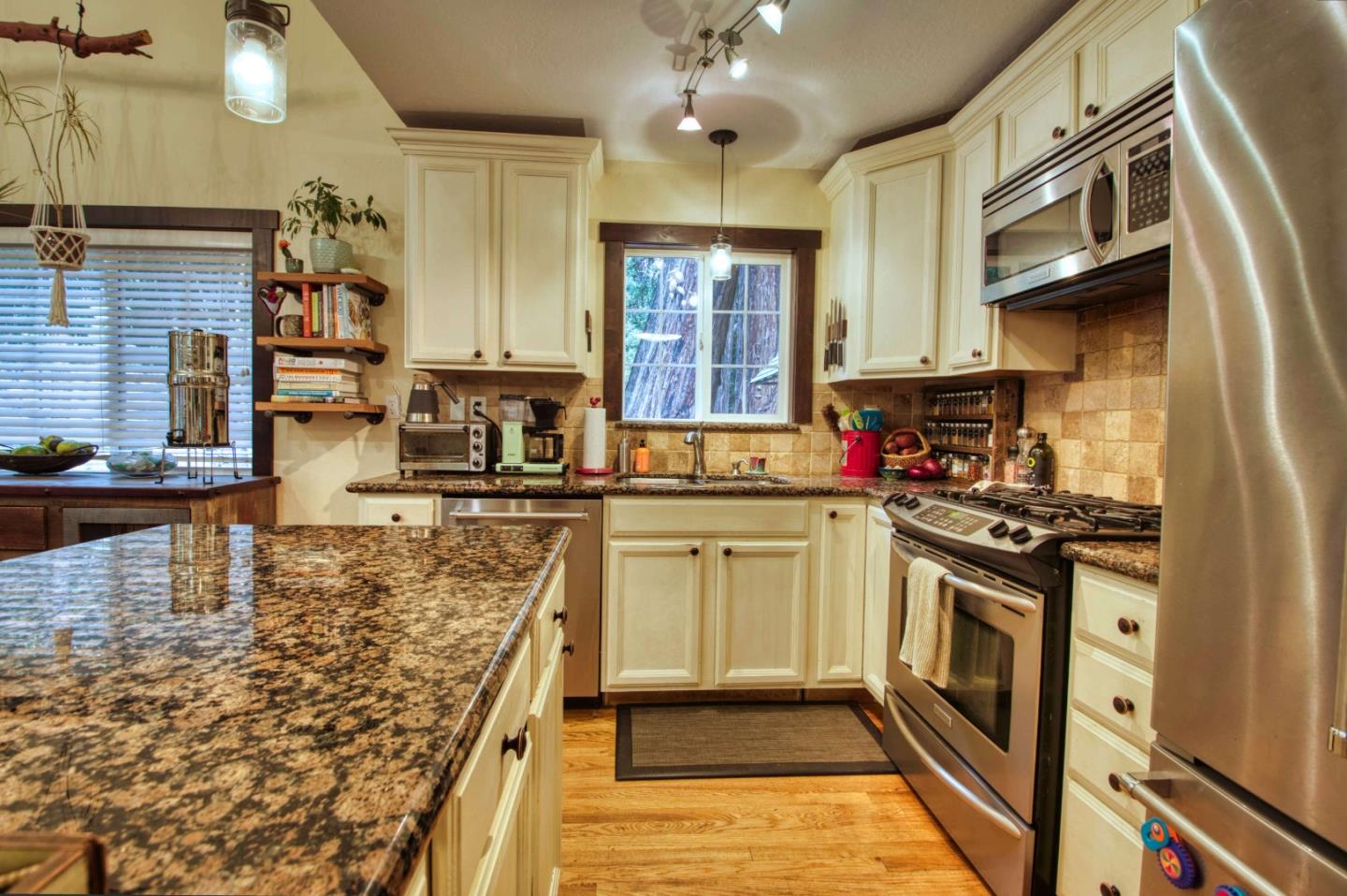 Long Ridge Road Los Gatos, CA 95033 - Photo 25 of 30 a kitchen with stainless steel appliances granite countertop a stove sink and cabinets