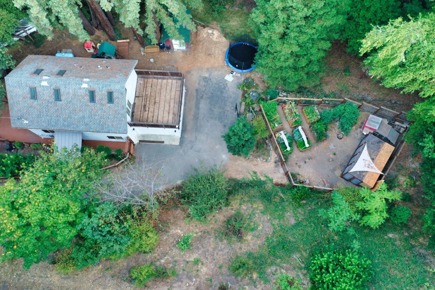 Long Ridge Road Los Gatos, CA 95033 - Photo 4 of 30 an aerial view of a house with a yard and garden