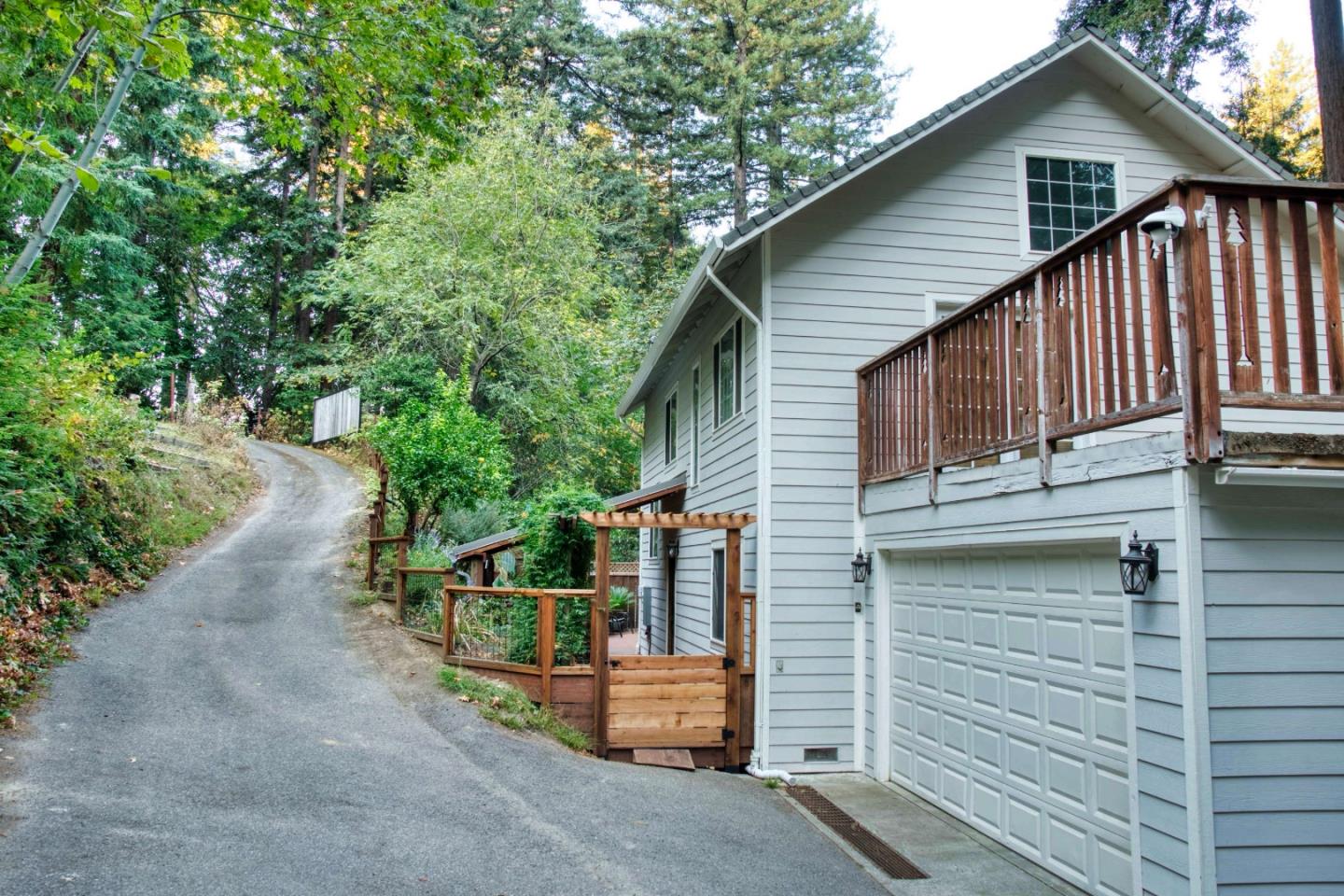 Long Ridge Road Los Gatos, CA 95033 - Photo 5 of 30 a view of a house with a yard and garage