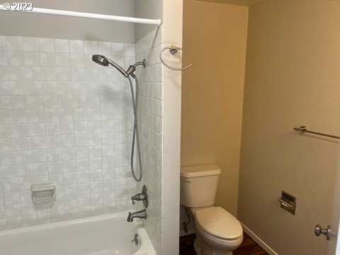 941 Prescott Lane Springfield, OR 97477 - Photo 12 of 15 a white toilet sitting next to a bath tub