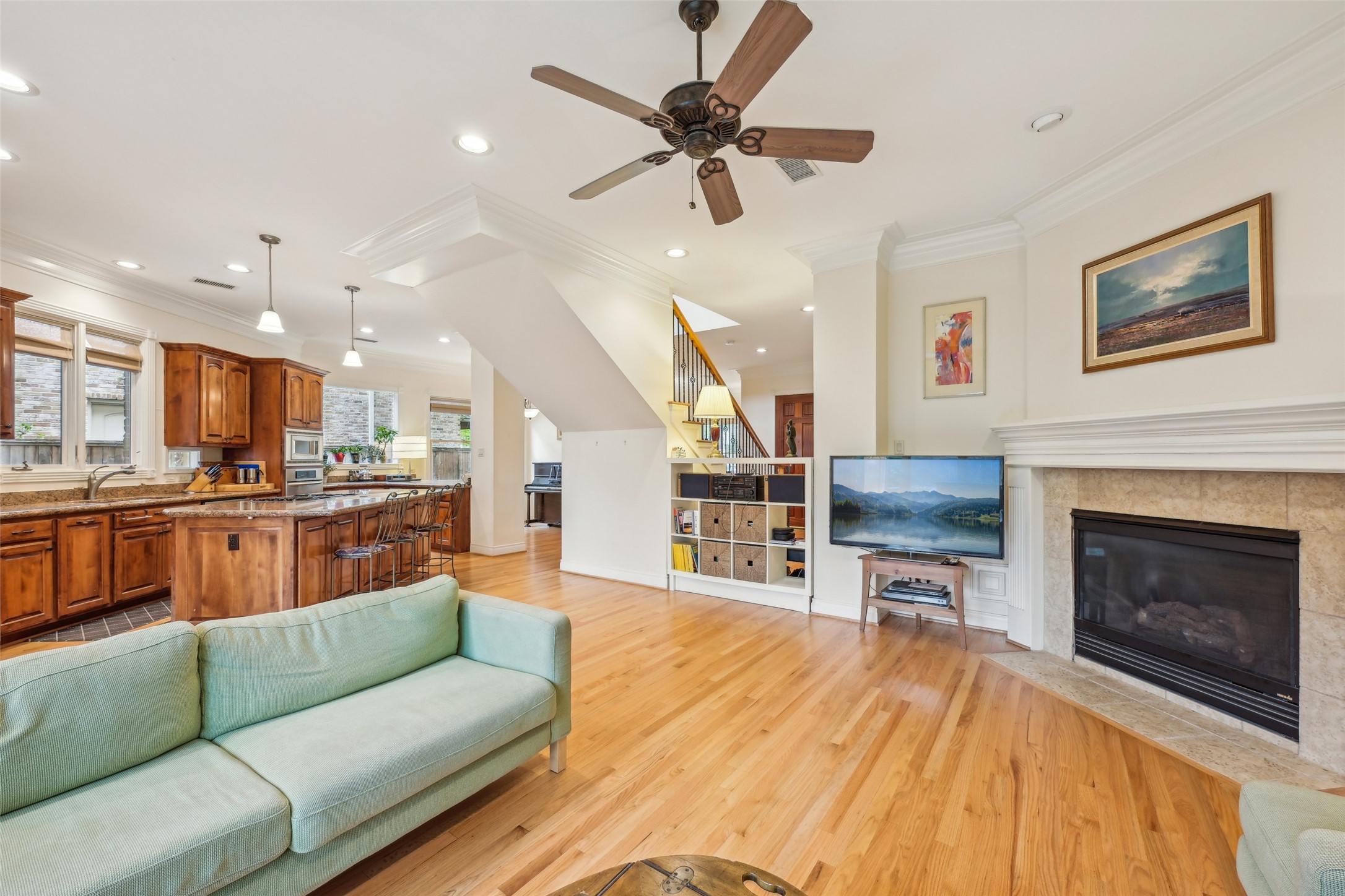 4026 Villanova Street Houston, TX 77005 - Photo 14 of 48 a living room with furniture and a fireplace