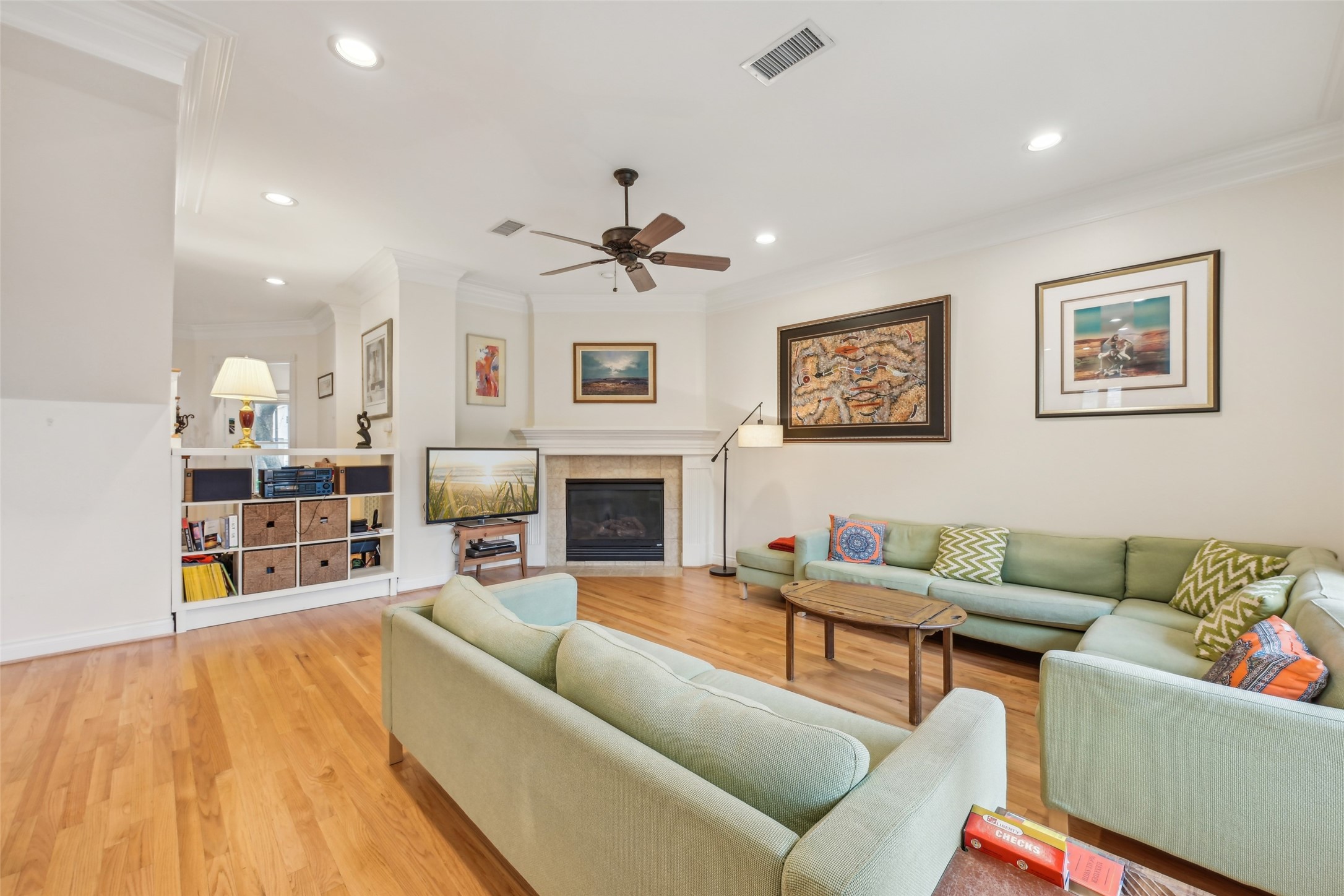 4026 Villanova Street Houston, TX 77005 - Photo 15 of 48 a living room with furniture and a fireplace