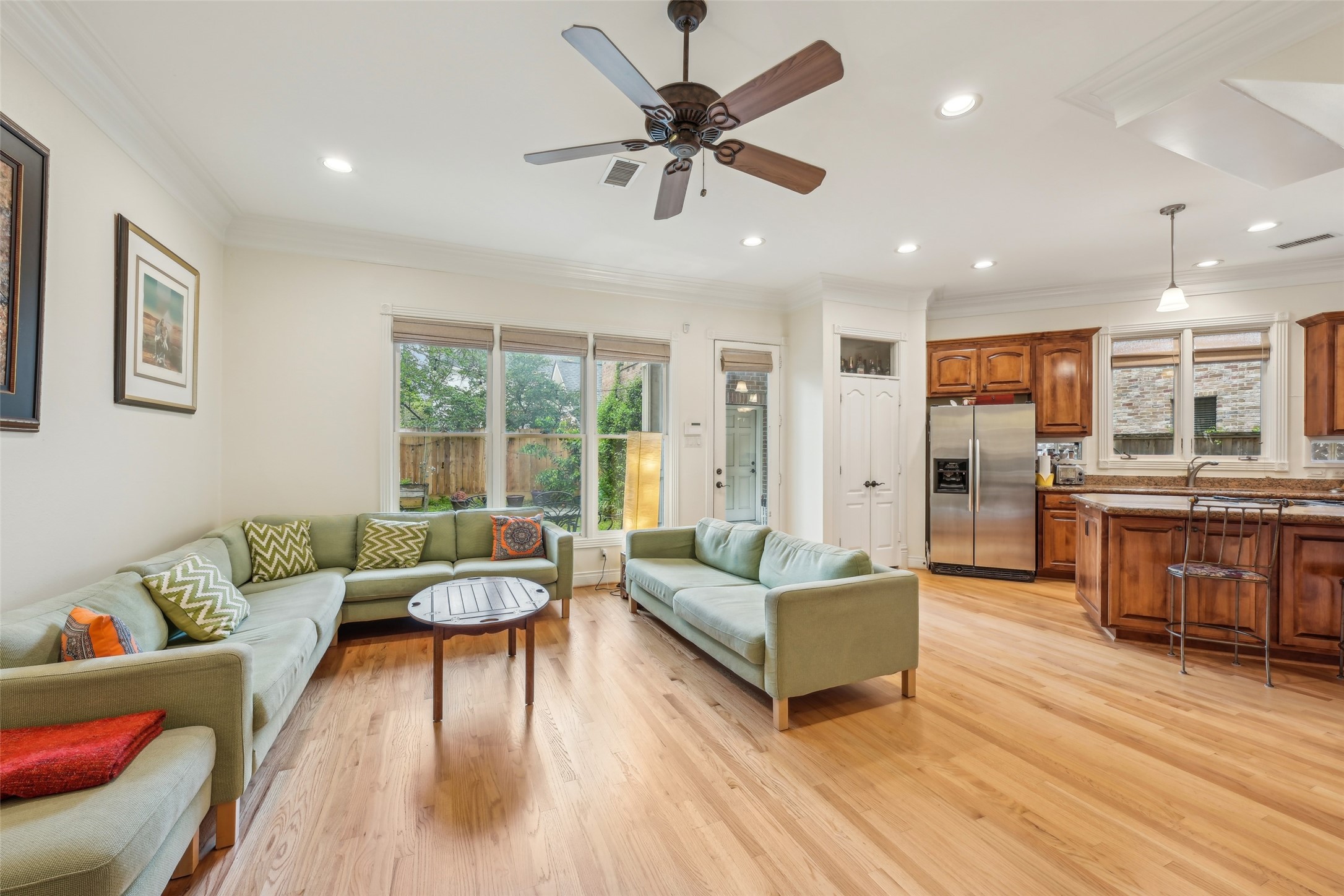 4026 Villanova Street Houston, TX 77005 - Photo 16 of 48 a living room with furniture and a large window