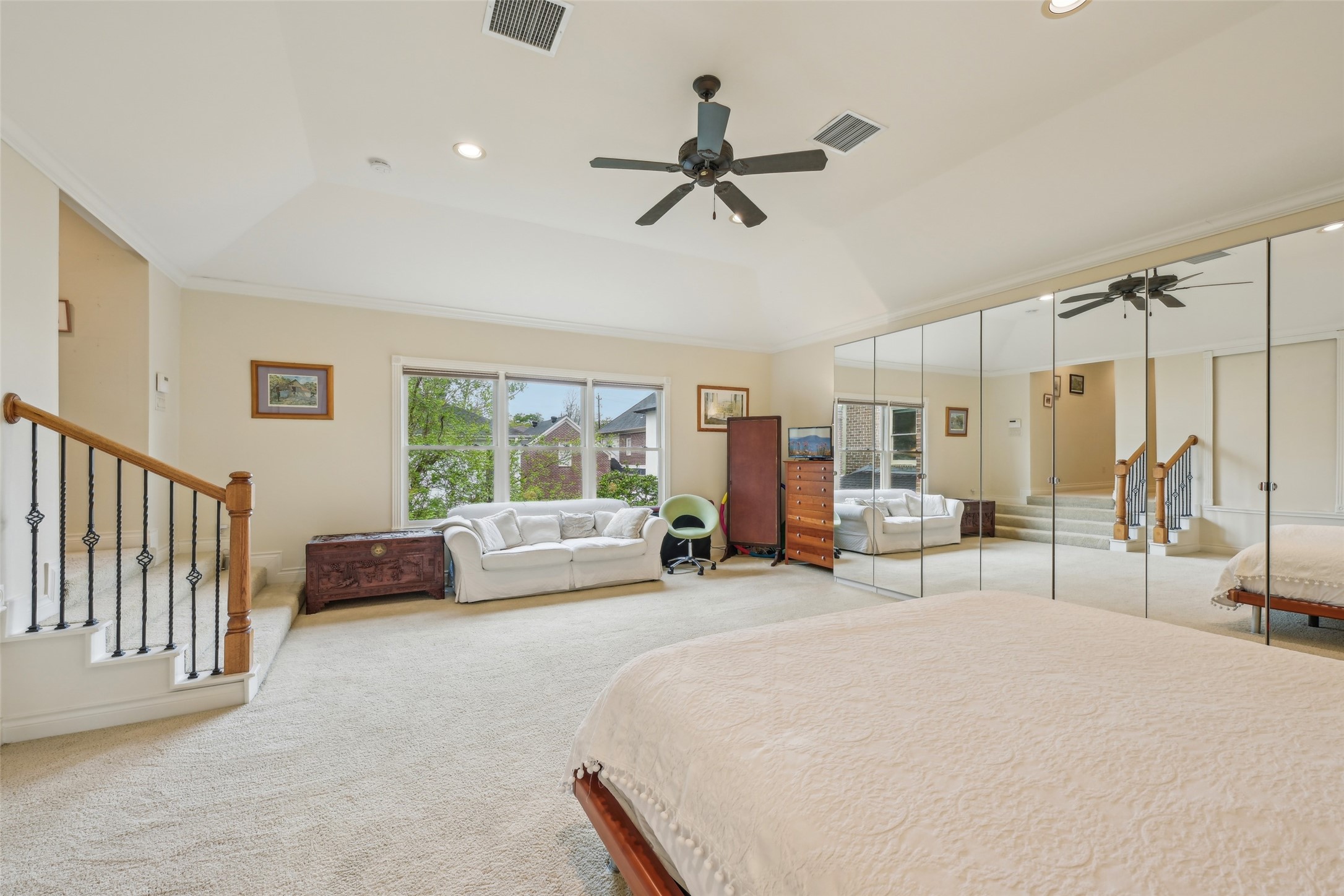 4026 Villanova Street Houston, TX 77005 - Photo 20 of 48 a living room with furniture and a large window