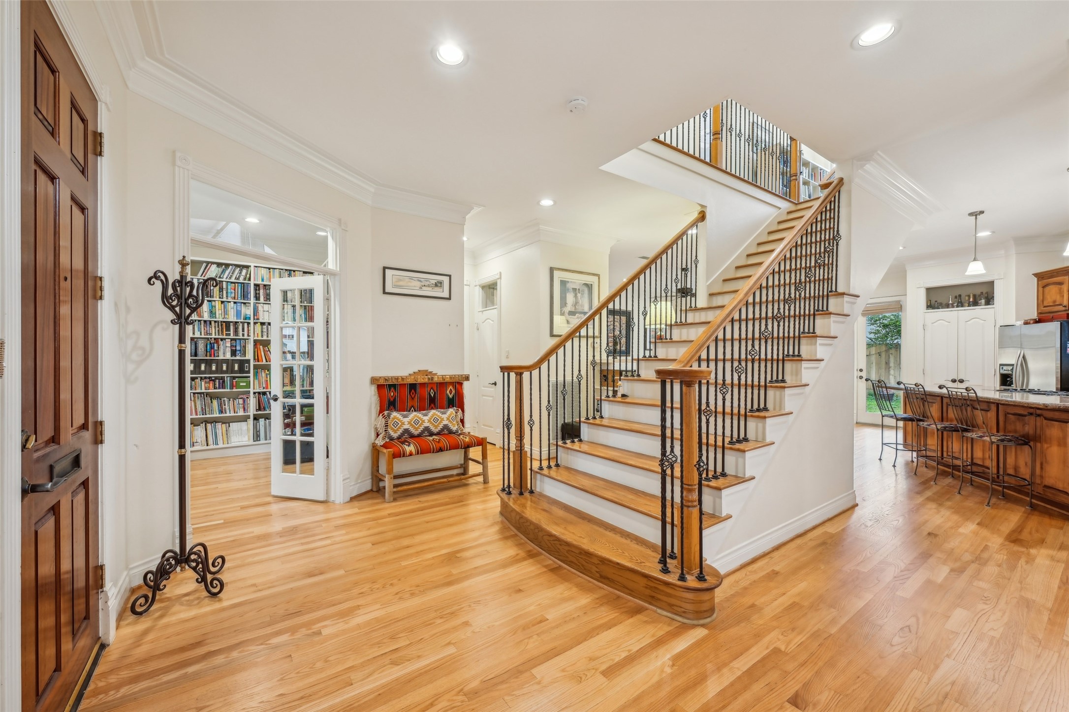 4026 Villanova Street Houston, TX 77005 - Photo 2 of 48 a view of entryway livingroom and hall with wooden floor
