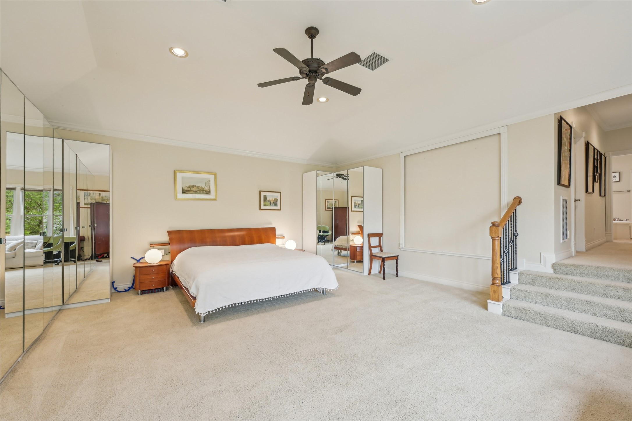 4026 Villanova Street Houston, TX 77005 - Photo 21 of 48 a bed room with a bed and a couch