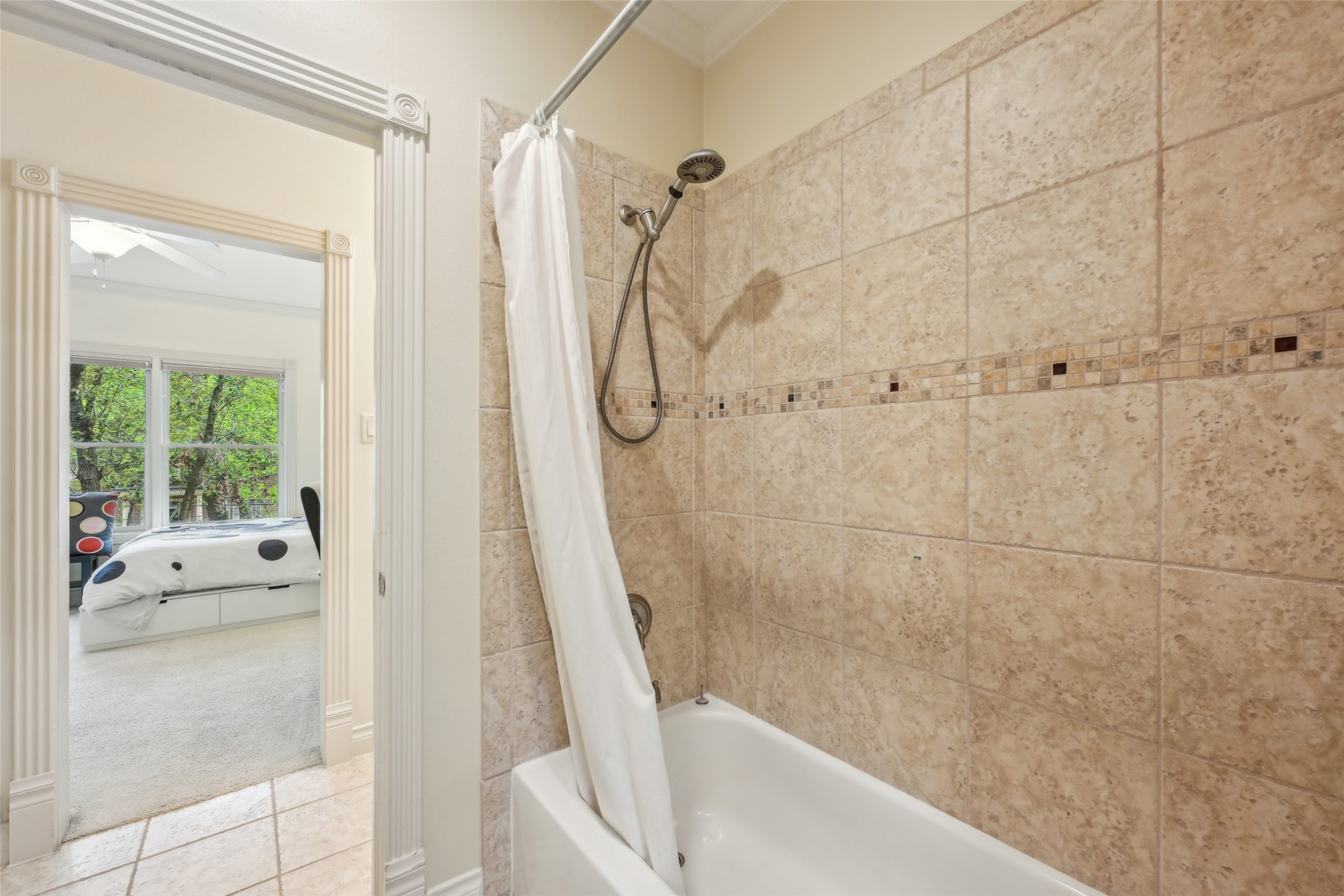 4026 Villanova Street Houston, TX 77005 - Photo 26 of 48 a bathroom with a tub