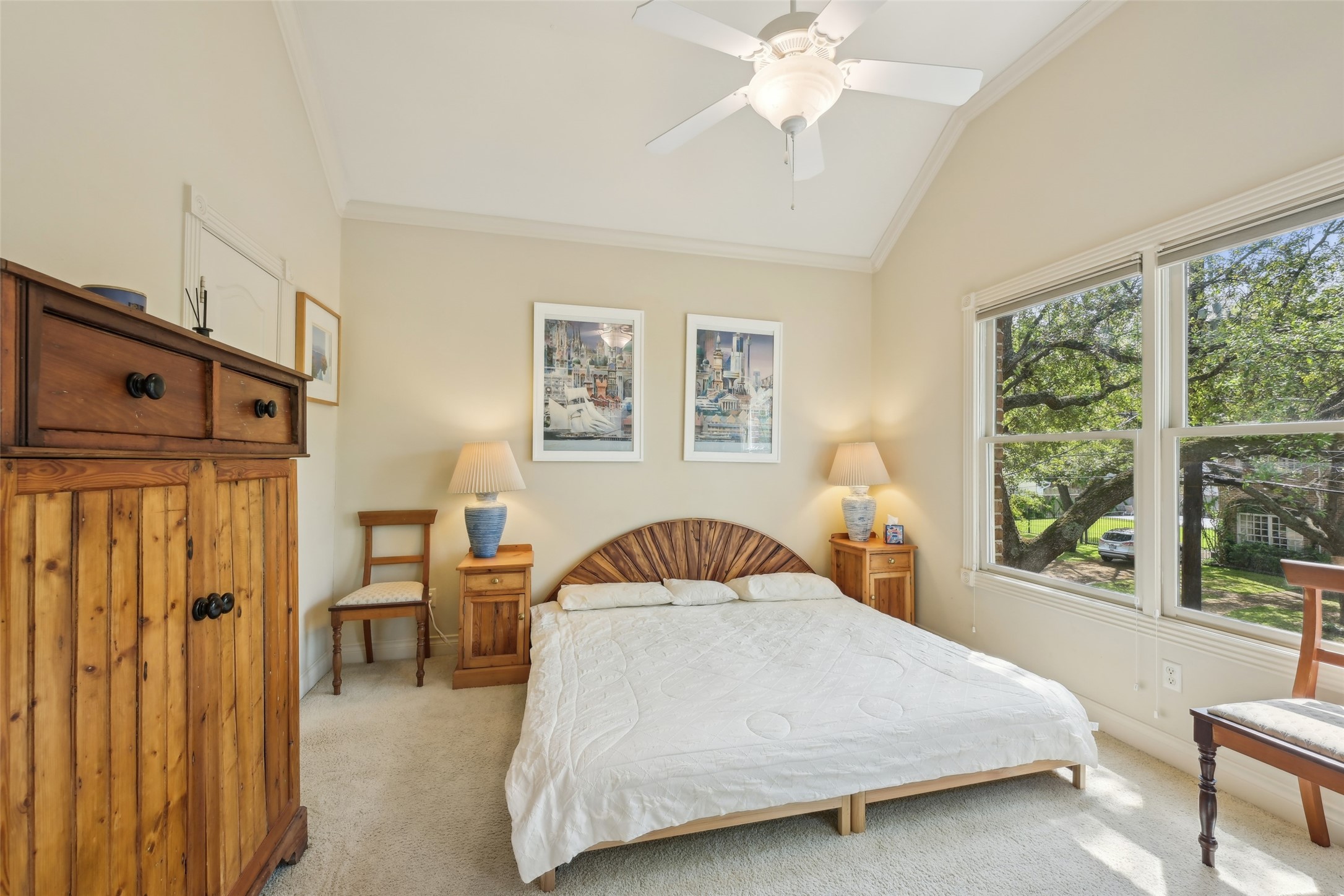 4026 Villanova Street Houston, TX 77005 - Photo 29 of 48 a bedroom with a bed and a window