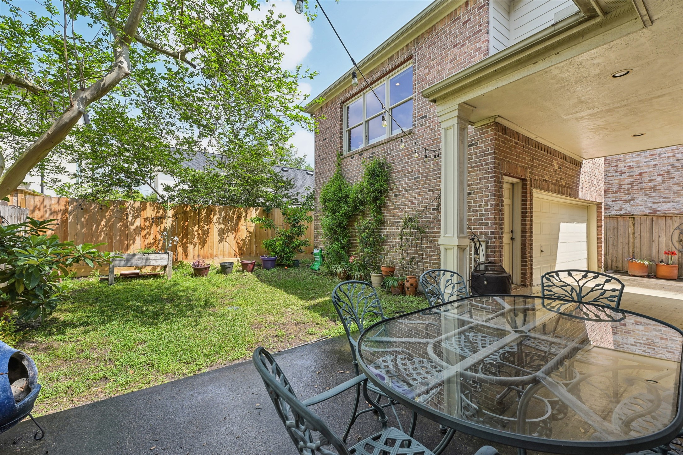 4026 Villanova Street Houston, TX 77005 - Photo 34 of 48 a view of outdoor space yard deck patio and outdoor seating