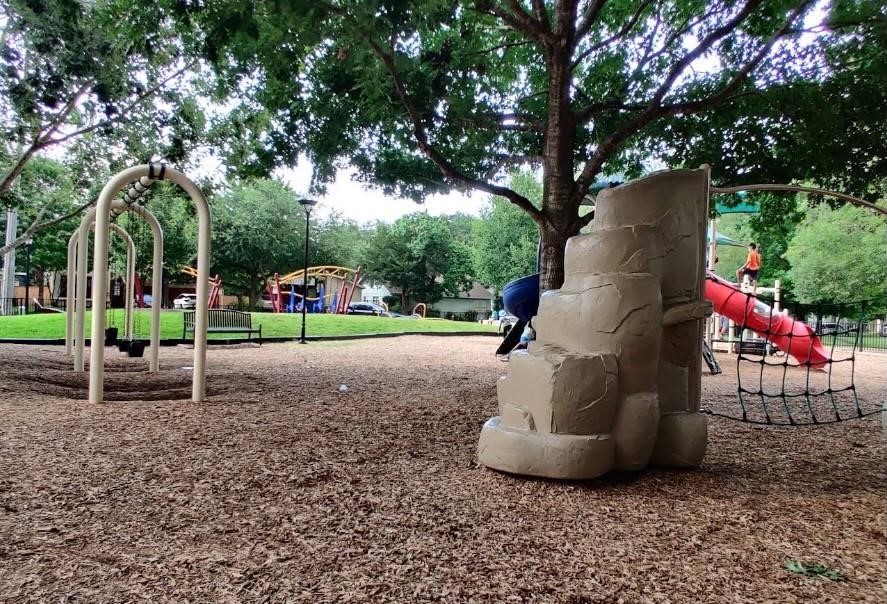 4026 Villanova Street Houston, TX 77005 - Photo 37 of 48 a view of a park with a slide