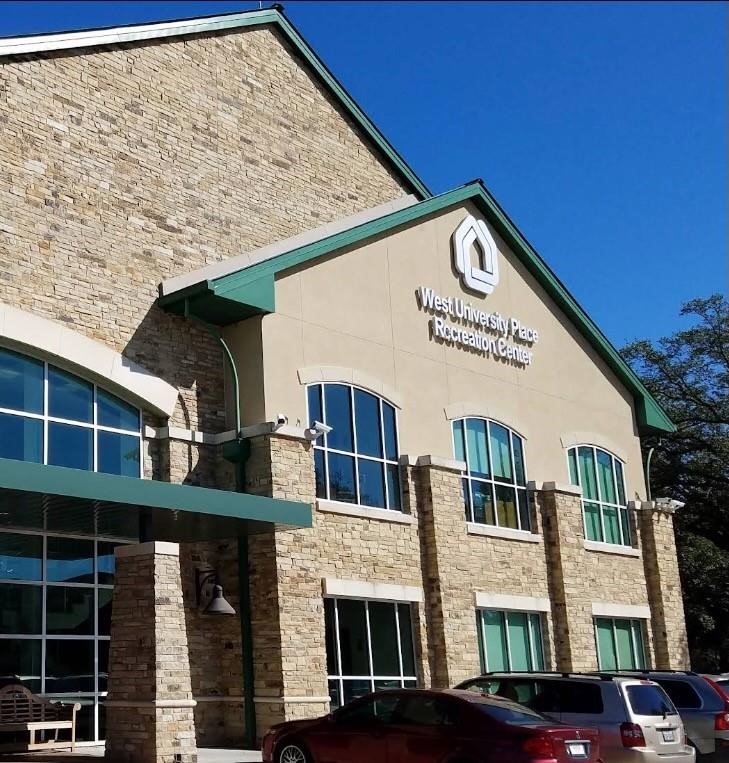 4026 Villanova Street Houston, TX 77005 - Photo 40 of 48 a front view of a building with large windows