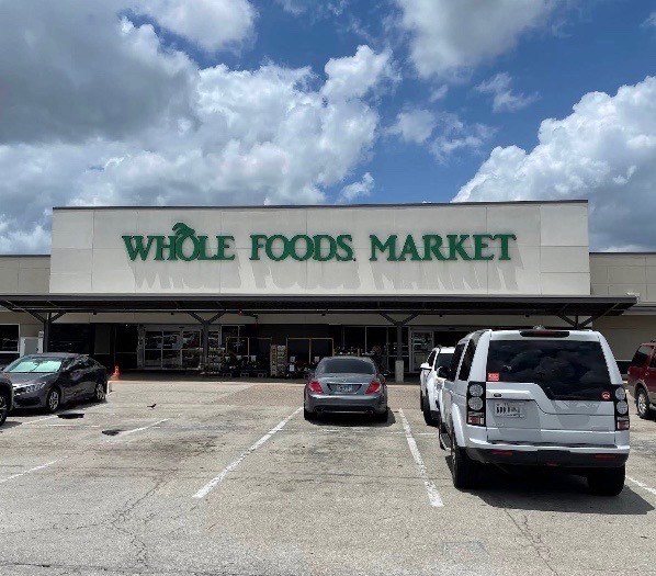 4026 Villanova Street Houston, TX 77005 - Photo 41 of 48 a car parked in front of a building