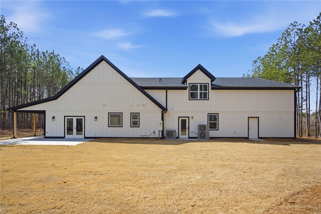 147 McAlister Road West Union, SC 29696 - Photo 2 of 49 This newly constructed home showcases a modern farmhouse design, nestled among mature trees.