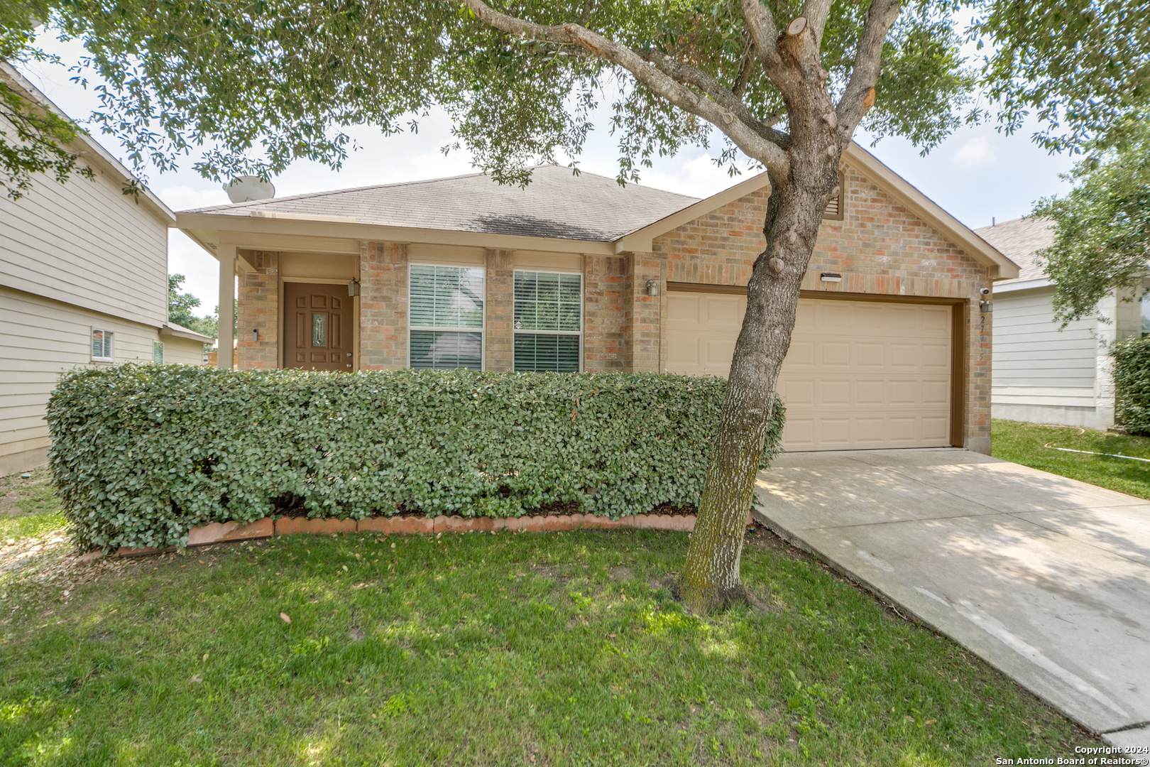 a view of a house with a garden