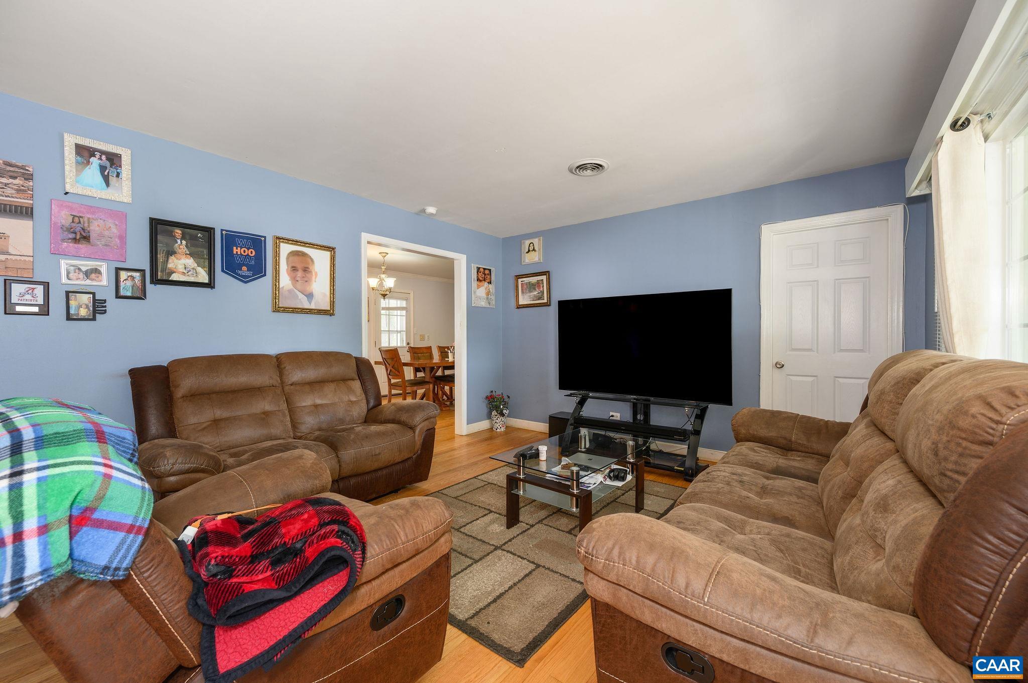 2806 Brookmere Road Charlottesville, VA 22901 - Photo 7 of 19 a living room with furniture and a flat screen tv
