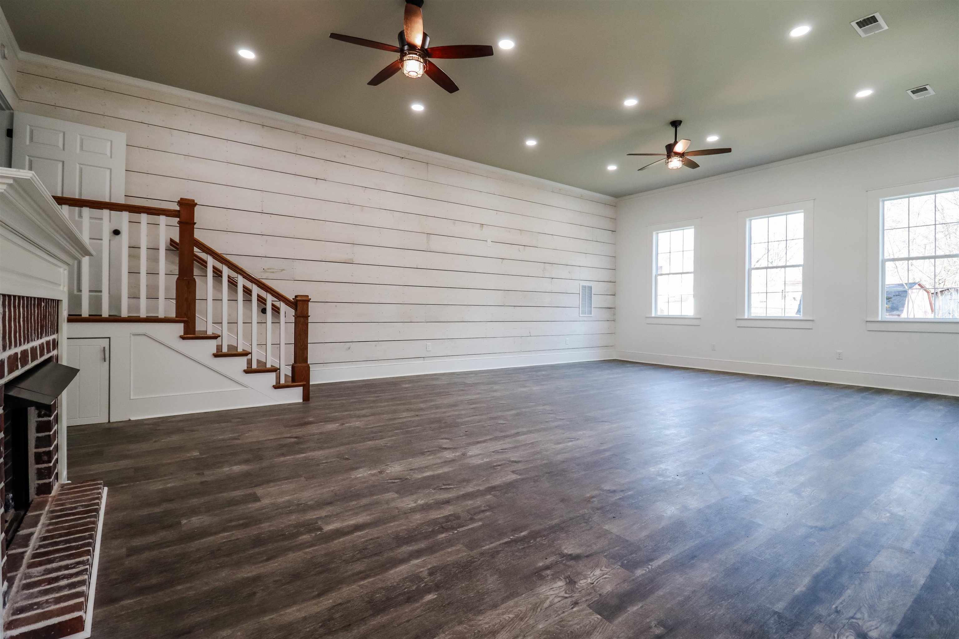 7237 Edith-Nankipoo Road Ripley, TN 38063 - Photo 13 of 31 a view of an empty room with wooden floor and a window