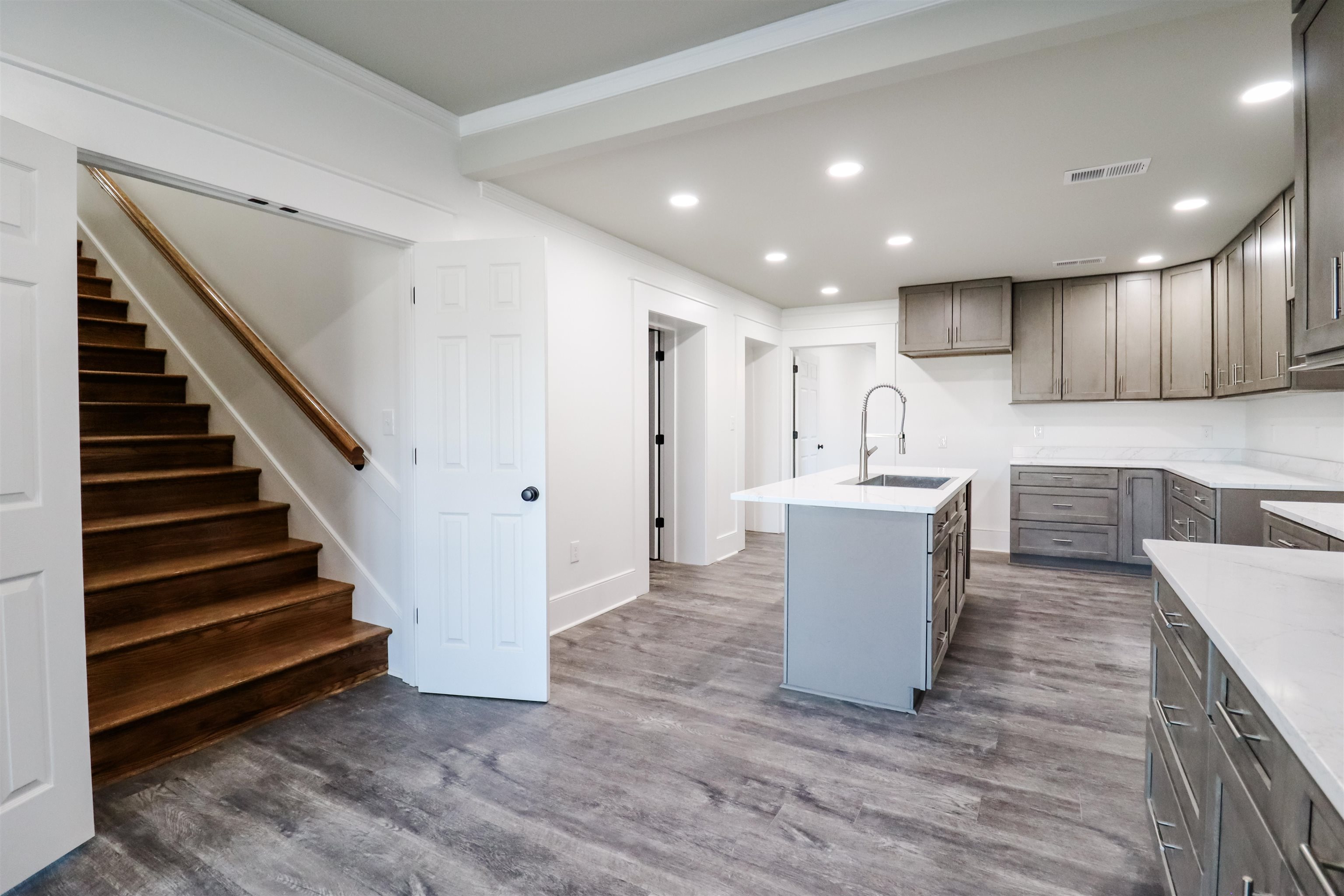 7237 Edith-Nankipoo Road Ripley, TN 38063 - Photo 10 of 31 a view of a kitchen with wooden floor and electronic appliances