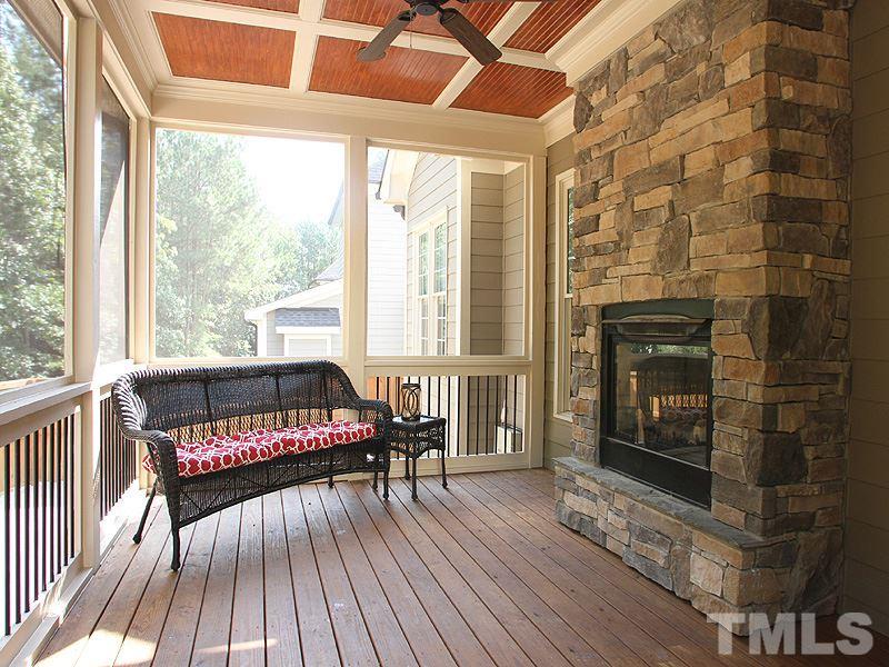 2317 Finley Ridge Lane Raleigh, NC 27615 - Photo 22 of 23 a living room with furniture and a fireplace