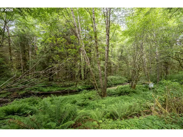 a view of a chair and table in the balcony