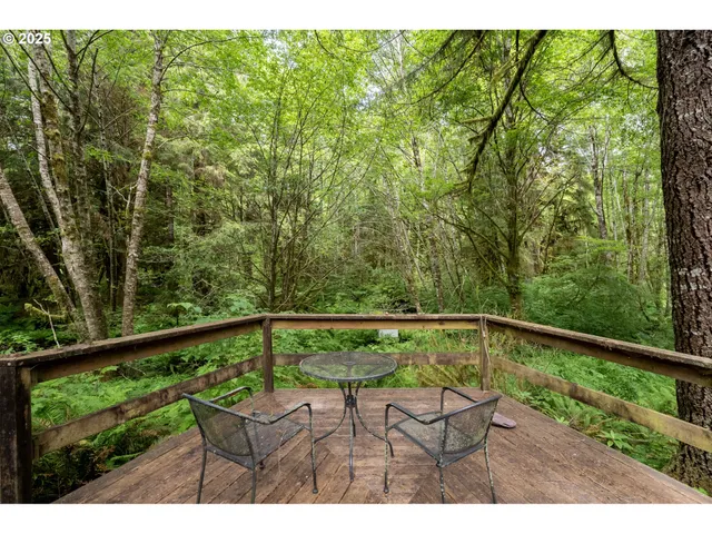a view of a balcony with chairs