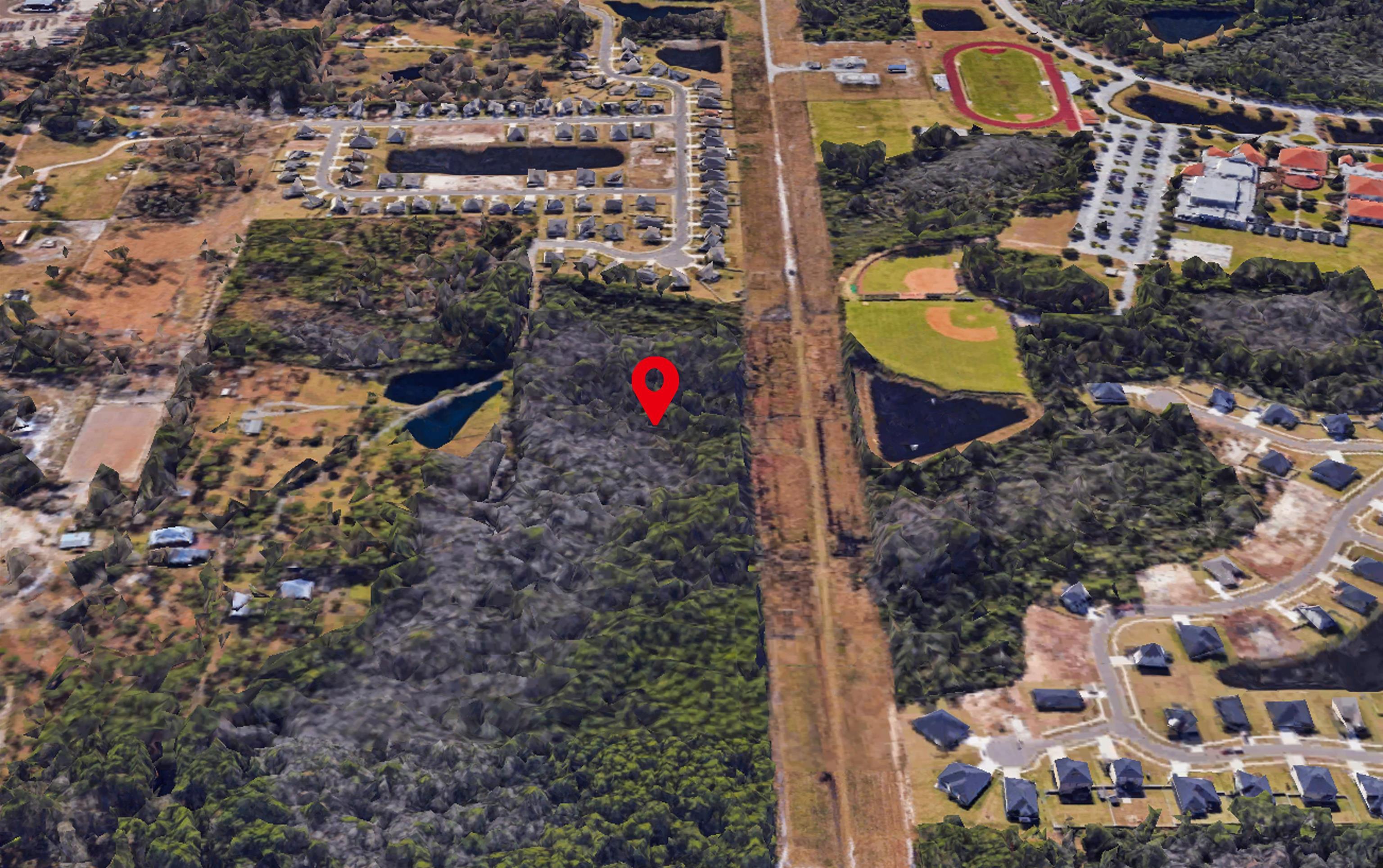 0 Magnolia Valley Drive Jacksonville, FL 32221 - Photo 6 of 10 Aerial view of property and surrounding area featuring nearby suburban area