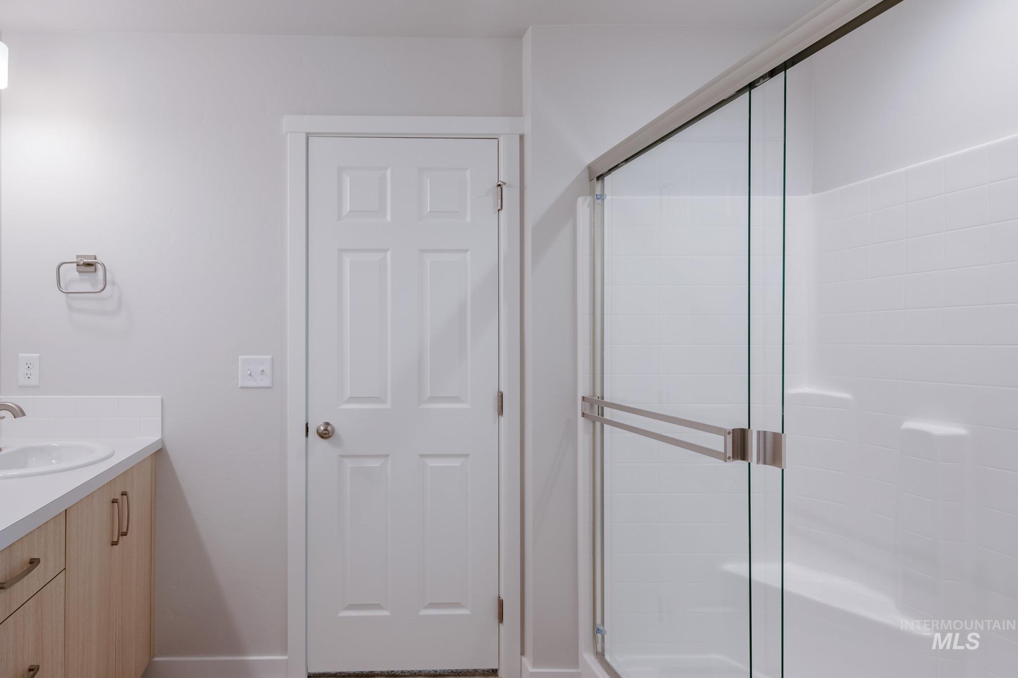 3089 South Maple Rnch Way Nampa, ID 83686 - Photo 15 of 22 Full bathroom featuring vanity and a stall shower