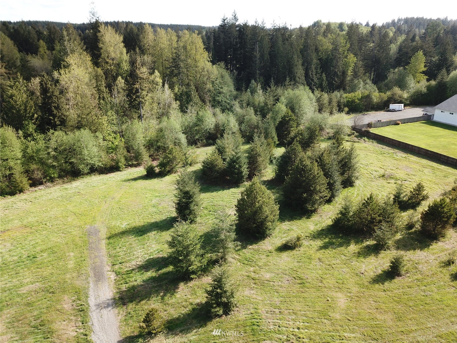 5825 139th Trail Southwest Rochester, WA 98579 - Photo 6 of 7 a view of a lake with a yard