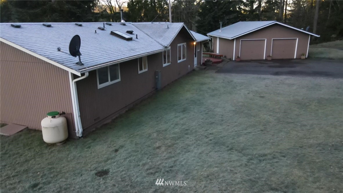 3327 Walsh Road Snohomish, WA 98290 - Photo 29 of 37 a view of a house with backyard